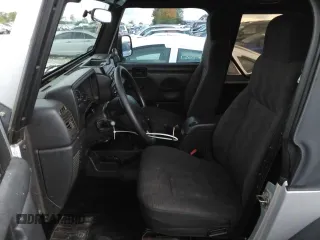 2004 Jeep Wrangler X with VIN 1J4FA39S24P714961, listed as a Copart auction lot 57871235 with 123,164 mi miles and Clean title. Bid and sale history available at DreamBid. Image 7.
