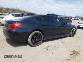 2015 BMW 6 Series 650i z VIN WBA6B2C50FGB99462, wystawiony jako Copart lot #54058515 z przebiegiem 96 662 mil mil oraz Tytuł czysty. Historia ofert i sprzedaży dostępna na DreamBid. Obrazek 3.
