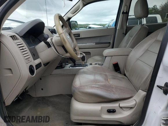 2011 Ford Escape Hybrid with VIN 1FMCU4K30BKB66313, listed as a Copart auction lot 58771165 with 297,214 mi miles and Salvage title. Bid and sale history available at DreamBid. Image 7.
