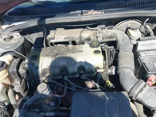 2000 Saturn SL with VIN 1G8ZH5284YZ111006, listed as a IAAI auction lot 41778862 with 155,852 mi miles. Bid and sale history available at carsss.com. Image 10.