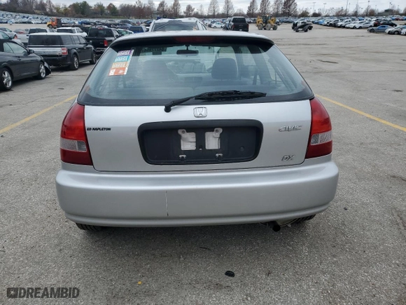 1999 Honda Civic DX with VIN 2HGEJ6446XH100761, listed as a Copart auction lot 84277854 with 82,619 mi miles and Clean Title. Bid and sale history available at carsss.com. Image 6.