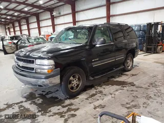 2003 Chevrolet Tahoe LT with VIN 1GNEC13Z43J340111, listed as a IAAI auction lot 41574135 with 251,307 mi miles. Bid and sale history available at carsss.com. Image 2.