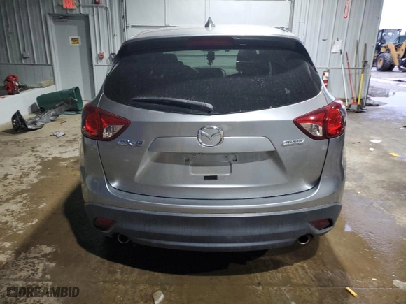 2014 Mazda CX-5 Touring with VIN JM3KE2CY1E0321454, listed as a Copart auction lot 45710035 with 134,378 mi miles and Salvage Title. Bid and sale history available at carsss.com. Image 6.
