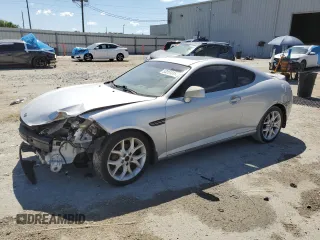 2008 Hyundai Tiburon GT z VIN KMHHN66F88U284030, wystawiony jako Copart lot #53251315 z przebiegiem Nie podano mil oraz Szkody całkowita. Historia ofert i sprzedaży dostępna na DreamBid. Obrazek 1.