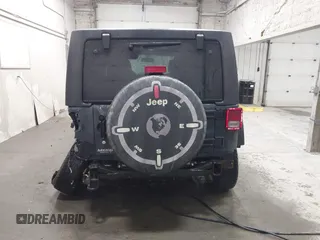 2018 Jeep Wrangler JK Unlimited Sport with VIN 1C4BJWDG9JL890272, listed as a IAAI auction lot 41551844 with 77,655 mi miles. Bid and sale history available at carsss.com. Image 17.