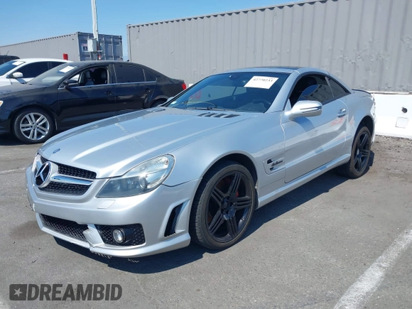 2009 Mercedes-Benz SL 55/63 AMG with VIN WDBSK70F69F148436, listed as a IAAI auction lot 42770233 with 120,523 mi miles and . Bid and sale history available at DreamBid. Image 17.