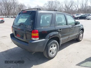 2003 Ford Escape XLS Popular with VIN 1FMYU02153KB46301, listed as a IAAI auction lot 41793418 with 188,184 mi miles and . Bid and sale history available at DreamBid. Image 4.