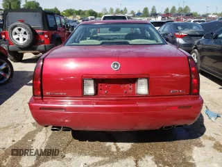 2000 Cadillac Eldorado Touring ETC z VIN 1G6ET129XYU191433, wystawiony jako Copart lot #58108224 z przebiegiem 76 957 mil mil oraz Szkody całkowita. Historia ofert i sprzedaży dostępna na DreamBid. Obrazek 6.