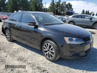 2014 Volkswagen Jetta SE z VIN 3VWD17AJ2EM397825, wystawiony jako Copart lot #64076595 z przebiegiem 61 691 mil mil oraz Szkoda całkowita • Salvage title. Historia ofert i sprzedaży dostępna na DreamBid. Obrazek 4.