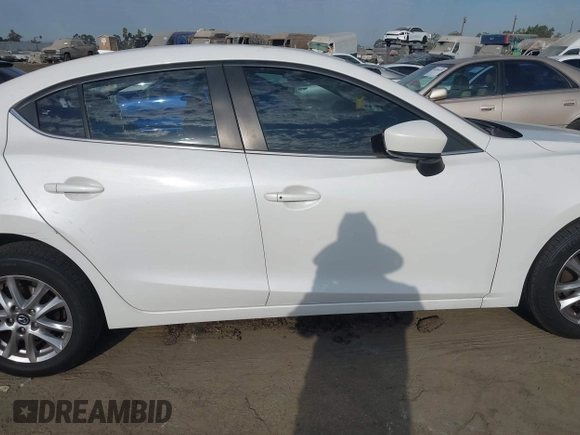 2016 Mazda 3 i Grand Touring with VIN JM1BM1X73G1346876, listed as a IAAI auction lot 40283164 with 102,264 mi miles and . Bid and sale history available at DreamBid. Image 14.