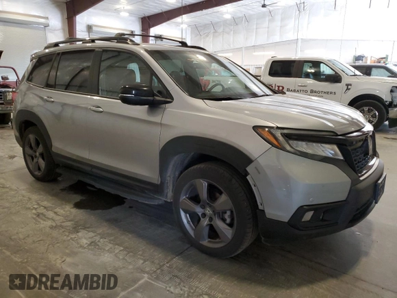 2020 Honda Passport Touring z VIN 5FNYF8H90LB001755, wystawiony jako Copart lot #75434854 z przebiegiem 48 984 mil mil oraz Szkoda całkowita • Salvage title. Historia ofert i sprzedaży dostępna na DreamBid. Obrazek 4.