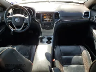 2014 Jeep Grand Cherokee Overland with VIN 1C4RJFCG7EC153156, listed as a Copart auction lot 52452925 with 152,348 mi miles and Salvage Title. Bid and sale history available at DreamBid. Image 8.