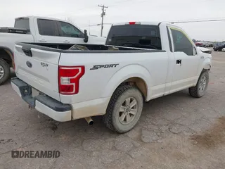 2018 Ford F-150 XL with VIN 1FTMF1CB6JKF34886, listed as a IAAI auction lot 42057393 with 129,936 mi miles and . Bid and sale history available at DreamBid. Image 4.