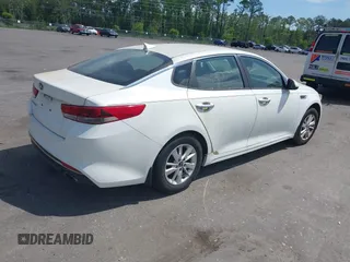 2016 Kia Optima LX z VIN KNAGT4L3XG5095972, wystawiony jako IAAI lot #42130422 z przebiegiem 103 420 mil mil oraz . Historia ofert i sprzedaży dostępna na DreamBid. Obrazek 4.