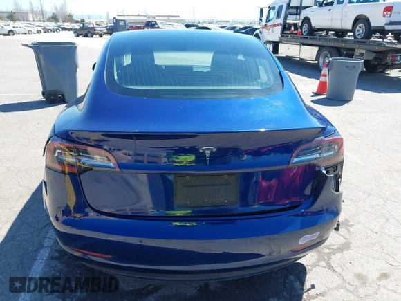2019 Tesla Model 3 Mid Range with VIN 5YJ3E1EA0KF425079, listed as a IAAI auction lot 41871022 with 61,684 mi miles and . Bid and sale history available at DreamBid. Image 16.