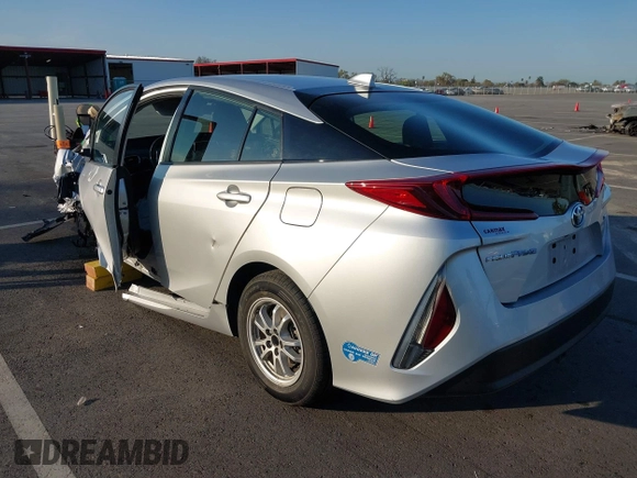 2021 Toyota Prius LE with VIN JTDKAMFP1M3196066, listed as a IAAI auction lot 41752179 with 90,200 mi miles and . Bid and sale history available at DreamBid. Image 3.