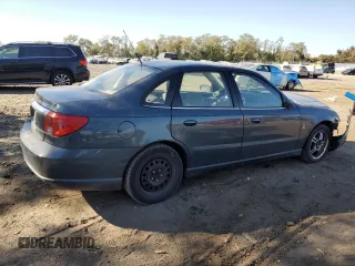 2004 Saturn L with VIN 1G8JC54F04Y519624, listed as a Copart auction lot 77407384 with Not Provided miles and Salvage Title. Bid and sale history available at carsss.com. Image 3.
