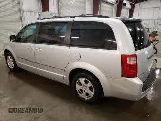 2010 Dodge Grand Caravan SXT with VIN 2D4RN5D19AR409665, listed as a Copart auction lot 46676445 with 174,063 mi miles and Salvage Title. Bid and sale history available at DreamBid. Image 2.