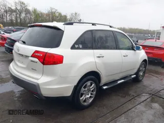 2009 Acura MDX Tech Pkg with VIN 2HNYD28689H518114, listed as a IAAI auction lot 42021557 with 303,364 mi miles. Bid and sale history available at carsss.com. Image 4.