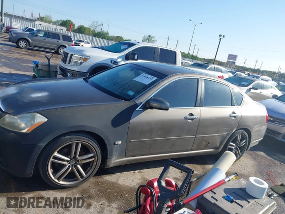 2007 Infiniti M Sport z VIN JNKAY01E97M312438, wystawiony jako IAAI lot #41868192 z przebiegiem 244 874 mil mil oraz . Historia ofert i sprzedaży dostępna na DreamBid. Obrazek 14.