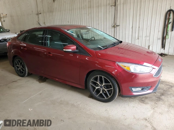 2016 Ford Focus SE with VIN 1FADP3F26GL253961, listed as a Copart auction lot 61583695 with 191,540 mi miles and Salvage title. Bid and sale history available at DreamBid. Image 4.