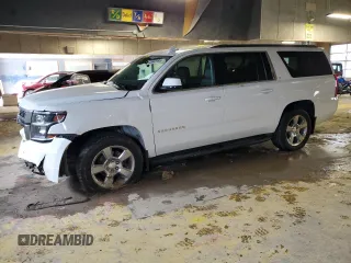 2020 Chevrolet Suburban LT with VIN 1GNSKHKC2LR187449, listed as a Copart auction lot 45943195 with 100,559 mi miles and Salvage Title. Bid and sale history available at carsss.com. Image 1.