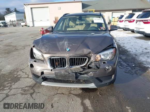2014 BMW X1 xDrive28i with VIN WBAVL1C56EVY19340, listed as a IAAI auction lot 41340436 with 85,867 mi miles. Bid and sale history available at carsss.com. Image 6.