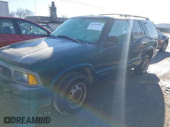 1997 GMC Jimmy SLS with VIN 1GKDT13W8V2548617, listed as a IAAI auction lot 41425063 with 153,008 mi miles. Bid and sale history available at carsss.com. Image 2.