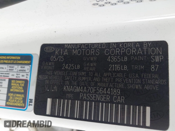 2015 Kia Optima LX with VIN KNAGM4A70F5644189, listed as a IAAI auction lot 42141090 with 140,346 mi miles. Bid and sale history available at carsss.com. Image 9.
