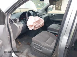 2006 Honda Odyssey EX with VIN 5FNRL38406B066176, listed as a IAAI auction lot 42028052 with 136,305 mi miles and . Bid and sale history available at DreamBid. Image 5.
