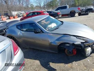 2009 Nissan 370Z Touring z VIN JN1AZ44E19M402223, wystawiony jako IAAI lot #41715048 z przebiegiem 89 123 mil mil oraz . Historia ofert i sprzedaży dostępna na DreamBid. Obrazek 13.