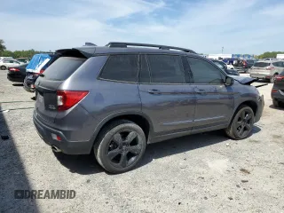 2021 Honda Passport Elite with VIN 5FNYF8H08MB014398, listed as a Copart auction lot 50499375 with 52,550 mi miles and Salvage Title. Bid and sale history available at carsss.com. Image 3.