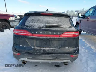 2015 Lincoln MKC with VIN 5LMTJ2AHXFUJ01440, listed as a IAAI auction lot 41526975 with 104,280 mi miles. Bid and sale history available at carsss.com. Image 16.