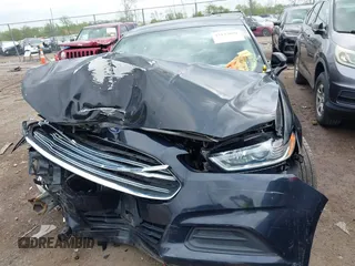 2014 Ford Fusion SE with VIN 1FA6P0H74E5392861, listed as a IAAI auction lot 42133099 with 130,373 mi miles. Bid and sale history available at carsss.com. Image 6.