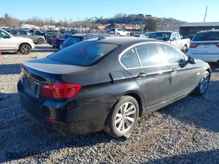 2015 BMW 5 Series 528i xDrive with VIN WBA5A7C57FD626517, listed as a IAAI auction lot 41226179 with 102,761 mi miles. Bid and sale history available at carsss.com. Image 4.