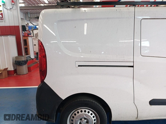 2019 Ram ProMaster City Cargo Tradesman z VIN ZFBHRFAB6K6M61931, wystawiony jako IAAI lot #42570041 z przebiegiem 152 309 mil mil oraz . Historia ofert i sprzedaży dostępna na DreamBid. Obrazek 34.