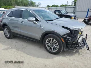 2024 Cadillac XT4 FWD Premium Luxury with VIN 1GYFZCR48RF169081, listed as a Copart auction lot 52429215 with 13,630 mi miles and Salvage title. Bid and sale history available at DreamBid. Image 4.