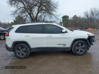 2016 Jeep Cherokee Latitude with VIN 1C4PJMCB7GW268714, listed as a IAAI auction lot 41655450 with 180,603 mi miles. Bid and sale history available at carsss.com. Image 14.