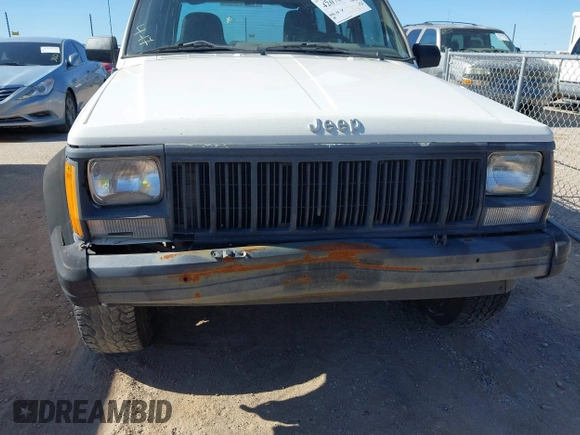 1996 Jeep Cherokee SE with VIN 1J4FJ28S0TL328637, listed as a IAAI auction lot 42078412 with 333,223 mi miles and . Bid and sale history available at DreamBid. Image 6.