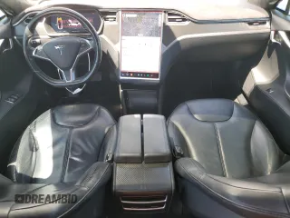2014 Tesla Model S 60 with VIN 5YJSA1H19EFP58677, listed as a Copart auction lot 61446345 with 150,152 mi miles and Salvage title. Bid and sale history available at DreamBid. Image 8.