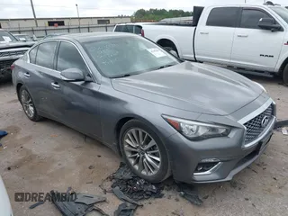 2021 Infiniti Q50 Luxe with VIN JN1EV7BP6MM702593, listed as a IAAI auction lot 41945690 with 53,083 mi miles and . Bid and sale history available at DreamBid. Image 1.