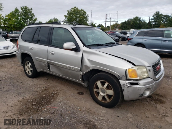 2005 GMC Envoy SLT with VIN 1GKDT13S252202866, listed as a Copart auction lot 70181524 with 169,603 mi miles and Salvage Title. Bid and sale history available at carsss.com. Image 4.