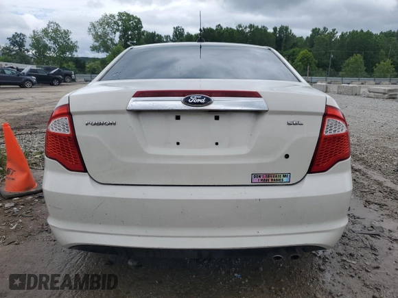 2012 Ford Fusion SEL with VIN 3FAHP0JA0CR249382, listed as a Copart auction lot 61173215 with 220,214 mi miles and Salvage title. Bid and sale history available at DreamBid. Image 6.