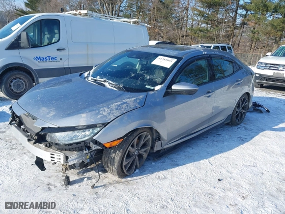 2018 Honda Civic Hatchback Sport Touring with VIN SHHFK7H92JU236456, listed as a IAAI auction lot 41385061 with 65,328 mi miles. Bid and sale history available at carsss.com. Image 20.