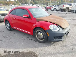 2012 Volkswagen Beetle 2.5L PZEV with VIN 3VWJP7AT0CM641164, listed as a IAAI auction lot 40698387 with 113,200 mi miles. Bid and sale history available at carsss.com. Image 1.