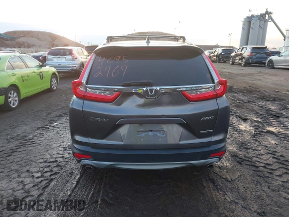 2017 Honda CR-V Touring with VIN 2HKRW2H94HH617081, listed as a IAAI auction lot 41294254 with 145,140 mi miles. Bid and sale history available at carsss.com. Image 16.