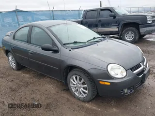 2004 Dodge Neon SXT with VIN 1B3ES56CX4D511892, listed as a IAAI auction lot 41891299 with 77,604 mi miles. Bid and sale history available at carsss.com. Image 1.