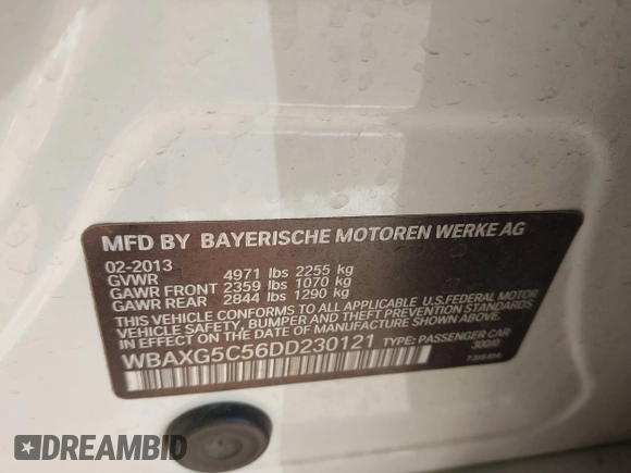 2013 BMW 5 Series 528i with VIN WBAXG5C56DD230121, listed as a IAAI auction lot 42019899 with 142,100 mi miles and . Bid and sale history available at carsss.com. Image 9.