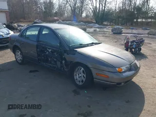 2000 Saturn SL z VIN 1G8ZK5275YZ244530, wystawiony jako IAAI lot #41784896 z przebiegiem 50 332 mil mil oraz . Historia ofert i sprzedaży dostępna na DreamBid. Obrazek 1.