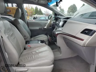2011 Toyota Sienna XLE z VIN 5TDDK3DC8BS013239, wystawiony jako Copart lot #74852364 z przebiegiem 212 060 mil mil oraz Szkoda całkowita • Salvage title. Historia ofert i sprzedaży dostępna na DreamBid. Obrazek 7.